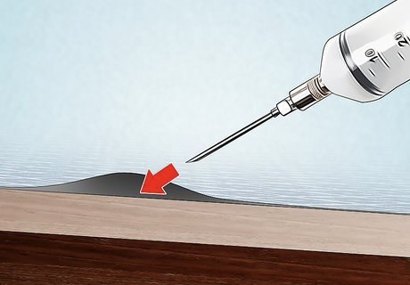 از بین بردن حباب در کاغذ دیواری